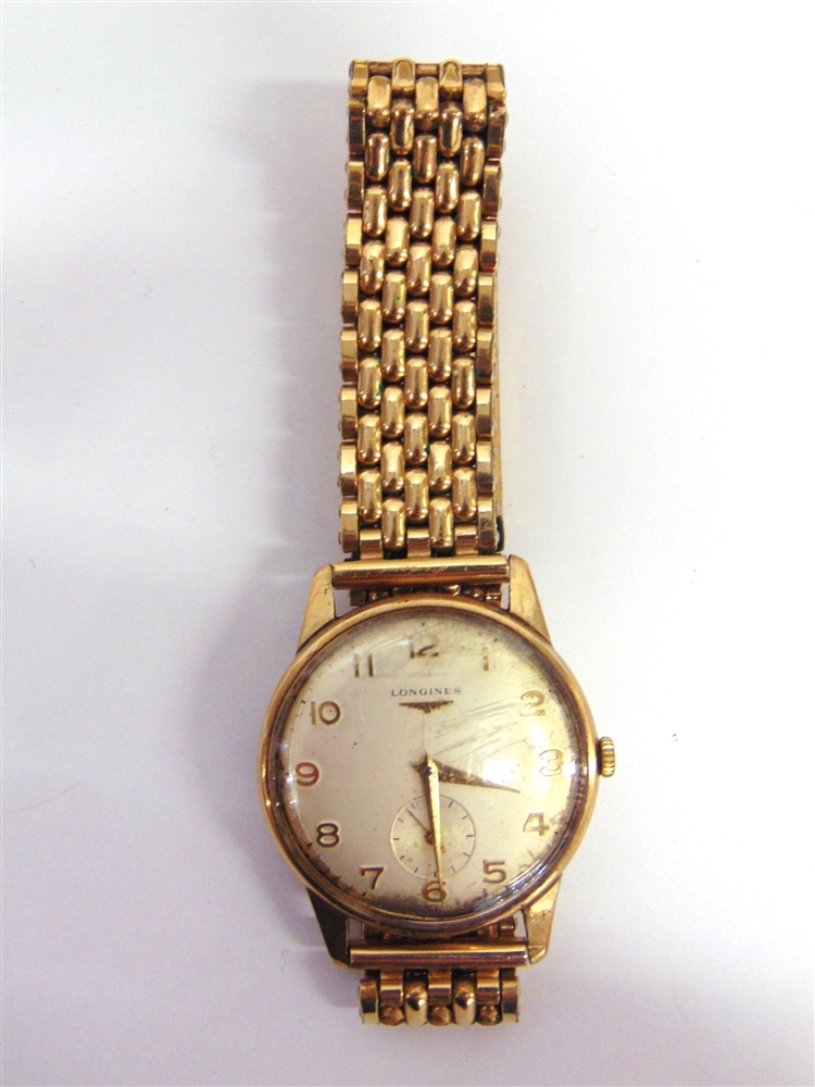 LONGINES, A GENTLEMAN'S 9 CARAT GOLD MECHANICAL WRIST WATCH the case with presentation