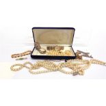 A UNIFORM ROW OF CULTURED PEARLS the seventy five pearls of approximately 6mm diameter, to a