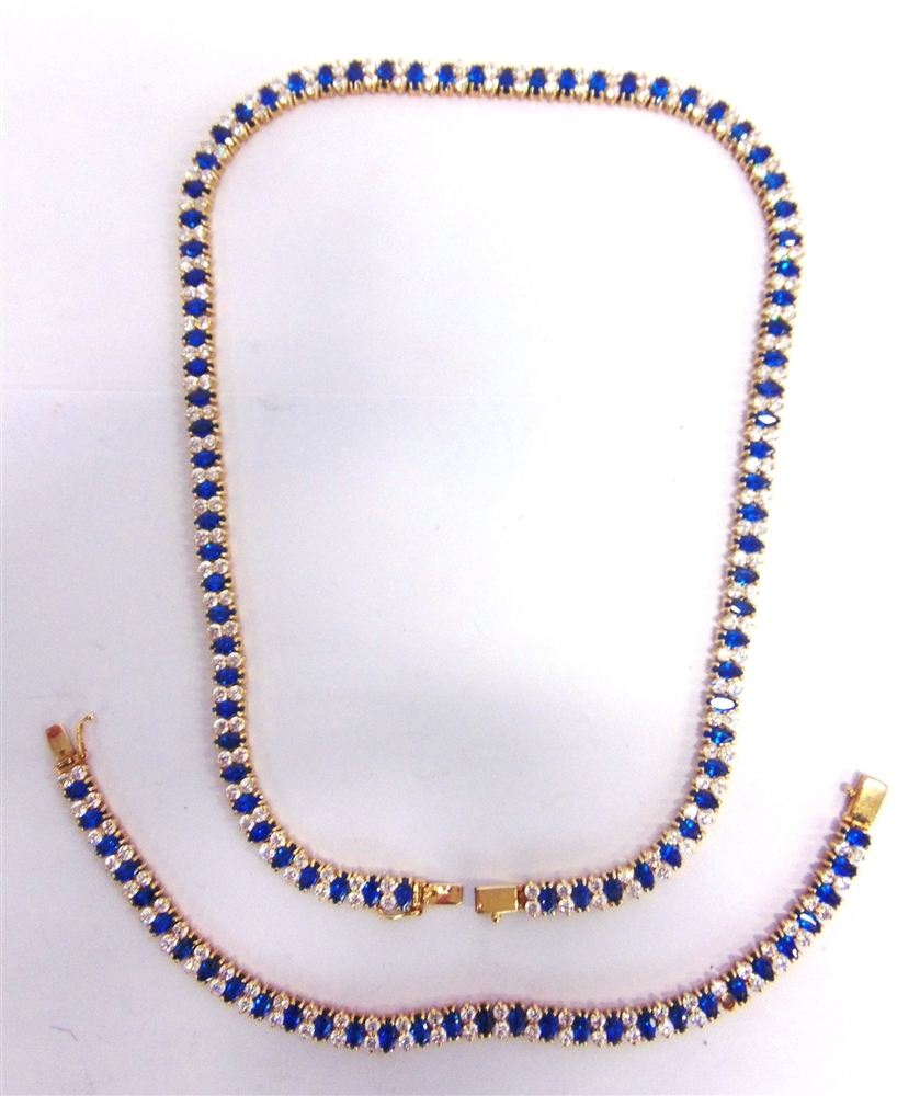 A NECKLACE AND MATCHING BRACELET set with blue and white synthetic stones, necklace 45.5cm long,