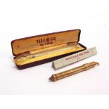 A VICTORIAN GILT METAL PROPELLING BRIDGE PENCIL inscribed with a silver 'Yard-o-Led' propelling