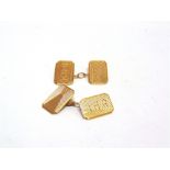 A PAIR OF 9 CARAT GOLD CUFFLINKS Birmingham 1931, the rectangular, monogrammed and engine turned