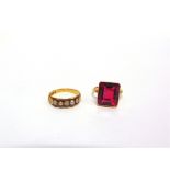 A 15CT GOLD RING set with simulated pearls, Chester 1880, finger size N, 2.9g gross; with a