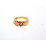 A LATE VICTORIAN 18 CARAT GOLD SINGLE STONE DIAMOND RING Birmingham 1892, the plain mount star set