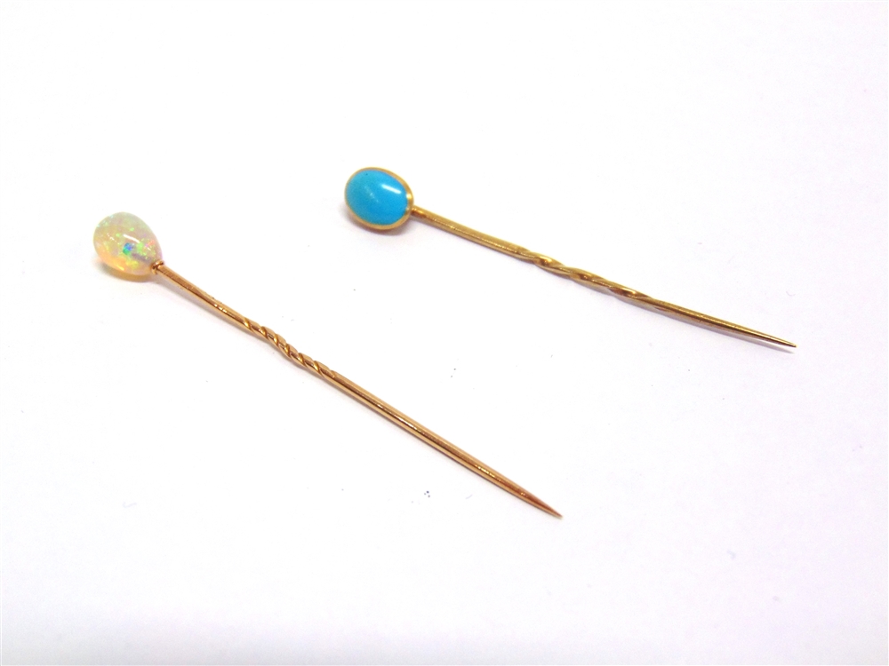 AN OPAL BEAD STICKPIN and a turquoise stickpin