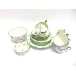 A SHELLEY PART TEA SERVICE decorated with shamrock sprays on a white ground, comprising six cups and