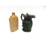 A VICTORIAN STONEWARE FLAGON relief moulded front and back with a figure of a dancing reveller and