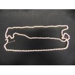 A THREE ROW UNIFORM CULTERED PEARL NECKLACE the 52/54/59 pearls of approximately 6.5mm - 6.8mm