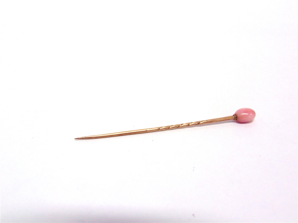 A CONCH PEARL STICKPIN the oval pearl approximately 7.5mm by 5.3mm