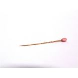 A CONCH PEARL STICKPIN the oval pearl approximately 7.5mm by 5.3mm