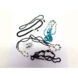 A COLLECTION OF FIVE BEAD NECKLACES including: turquoise and fresh water pearl; malachite; and
