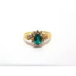 AN 18 CARAT GOLD DIAMOND AND SYNTHETIC EMERALD RING finger size U, 3.2g gross