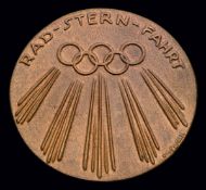 A Berlin 1936 Olympic Games medal for the Olympic Cycle Rally, In bronze, designed by Otto Placzek,