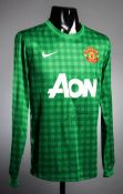 A green Manchester United replica goalkeeping jersey signed by Peter Schmeichel,