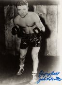 Framed signed photographic prints of the boxers Jake LaMotta ("Raging Bull") and Sir Henry Cooper,