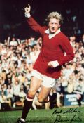A large signed colour photographic print of Denis Law,