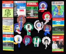 Eleven football rosettes, including F.A.