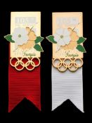 A pair of International Olympic Committee Atlanta 1996 105th Session badges, gilt & enamel,