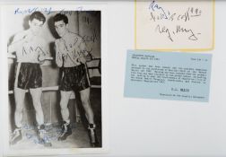 A photograph of the Kray Twins in boxing pose signed by Ronnie & Reg Kray and Detective Chief