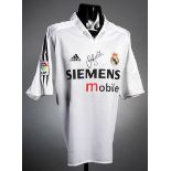 A David Beckham signed Real Madrid replica home jersey,