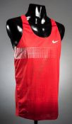 A Mo Farah signed athletics vest, the red Nike vest signed in silver marker pen,