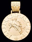 A gold first-place Ice Hockey prize medal for the 1986 European Cup in West Germany won by an