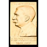 A Pierre de Coubertin memorial medal plaque, in gilt-bronze, signed R.