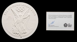 A Royal Mint plaster cast of the London 2012 Olympic Games prize medal,