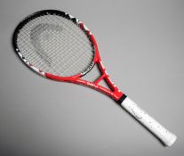 A Novak Djocovic signed tennis racquet, a Head Flex Point Fire Team,