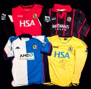 Four Blackburn Rovers player jerseys,