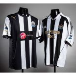 Two Newcastle United player jerseys, a Kieron Dyer black & white striped No.