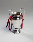 A miniature replica of the Champions League trophy as presented to players and officials at FC