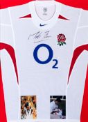 An England rugby shirt signed by Martin Johnson, signed in black marker pen,