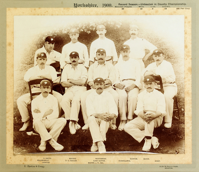 A sepia-toned team-group photograph of the 1900 Yorkshire county cricket side, published by E.