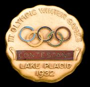 A rare Lake Placid 1932 Winter Olympic Games contestant's badge, gold-plated & enamel,