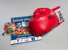 A Nigel Benn & Gerald McClellan double-signed boxing glove,