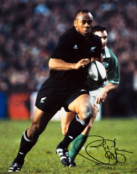 A Jonah Lomu signed photograph, 20 by 16in.