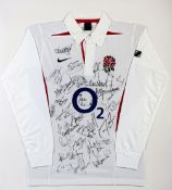 An England rugby shirt fully-signed by the 2003 World Cup winning squad,