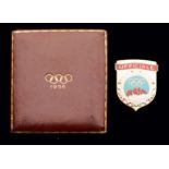 A Cortina 1956 Winter Olympic Games official's badge, gilt-metal & enamel, inscribed UFFICIALE,
