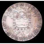 Innsbruck 1976 Winter Olympic Games participant's medal, silvered bronze, 50mm, by W.