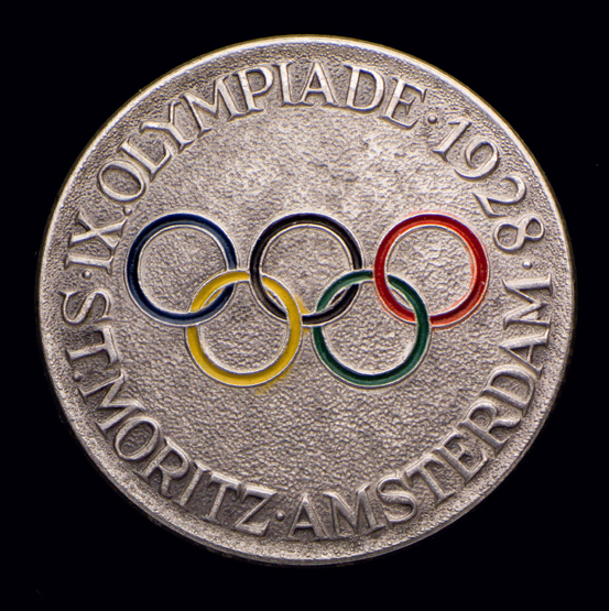 1928 Olympic lapel badge, with Olympic rings and inscribed IX OLYMPIADE 1928, ST MORITZ,