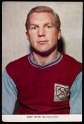 Bobby Moore signed colour magazine plate, 10 by 8in, Moore wearing West Ham kit.