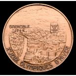 A 1968 Grenoble Winter Olympic Games participation medal, designed by M.