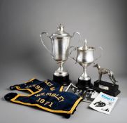 Tophies and presentations for four of Dolores Rocket's greyhound racing victories,