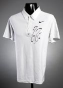 A Roger Federer signed white tennis shirt worn at the Cincinnati Masters in 2008, by Nike,