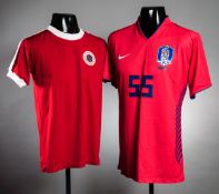 Two Asian international football jerseys, comprising: a red Kim Chi-Gon South Korea No.
