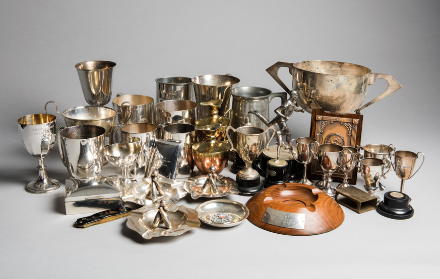 A collection of over 30 trophies, cups and cut glass presentations won by E.D.