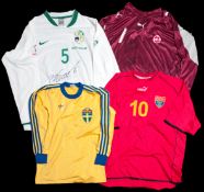 Four European international football jerseys, a signed Artim Sakiri red Macedonia No.