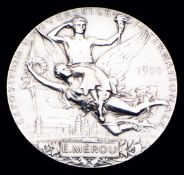 A 1900 Paris Exposition Universelle Internationale medal, designed by Chaplain, in silvered bronze,