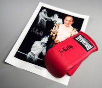 A Sir Henry Cooper signed boxing glove,