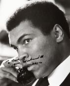 A Muhammad Ali signed photograph, a 10 by 8in.